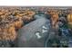 Expansive aerial view of a beautiful golf course lined with trees and three sand traps at 428 Vintage Hill Ln, Huntersville, NC 28078