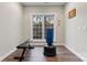 Bright home gym featuring hardwood floors, large windows, and workout equipment at 428 Vintage Hill Ln, Huntersville, NC 28078