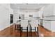 Well-lit kitchen with stainless steel appliances, center island, and ample counter space at 428 Vintage Hill Ln, Huntersville, NC 28078