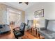 Office area featuring hardwood floors and seating area, perfect for meetings or relaxation at 428 Vintage Hill Ln, Huntersville, NC 28078