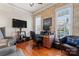 Bright office space with hardwood floors, natural light, and a functional workspace at 428 Vintage Hill Ln, Huntersville, NC 28078
