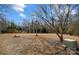 Backyard features open space and mature trees at 6610 Rolling Ridge Dr, Waxhaw, NC 28173
