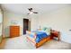 Cozy bedroom with a wooden bed frame, side table, and matching dresser at 6610 Rolling Ridge Dr, Waxhaw, NC 28173