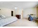 Spacious bedroom with a white ceiling fan, a queen bed, and a drum set at 6610 Rolling Ridge Dr, Waxhaw, NC 28173