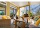 Cozy porch with comfortable seating and an outdoor fireplace perfect for entertaining at 6610 Rolling Ridge Dr, Waxhaw, NC 28173
