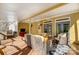 Inviting covered porch with comfortable seating and an outdoor kitchen at 6610 Rolling Ridge Dr, Waxhaw, NC 28173