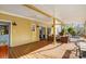 Inviting porch with outdoor seating, ceiling fans, and a view of the backyard at 6610 Rolling Ridge Dr, Waxhaw, NC 28173