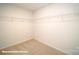 Walk-in closet with carpeted floor and wire shelving at 124 Rustling Waters Dr, Mooresville, NC 28117