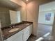 Bathroom with double vanity, granite countertops, and a tub at 168 Salem Springs Ln, Statesville, NC 28625