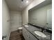 Bathroom with double vanity, granite countertops, and tub at 168 Salem Springs Ln, Statesville, NC 28625