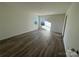 Bright bedroom featuring wood-look floors and large window at 168 Salem Springs Ln, Statesville, NC 28625