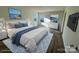 Relaxing bedroom with a cozy bed, neutral color scheme, and ample natural light at 168 Salem Springs Ln, Statesville, NC 28625