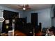 Bedroom with hardwood floors, natural light, and a modern ceiling fan at 1840 Findlay St, Gastonia, NC 28052