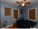Bedroom with hardwood floors, natural light, and a ceiling fan at 1840 Findlay St, Gastonia, NC 28052