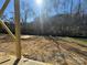 The backyard has a line of trees at the rear of the property at 200 Fostoria Pl # 78A, Albemarle, NC 28001