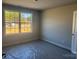 Bright, unfinished bedroom features a large window, natural light, and neutral paint at 200 Fostoria Pl # 78A, Albemarle, NC 28001