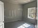 A bedroom is under construction with paint and plastic floor covering at 200 Fostoria Pl # 78A, Albemarle, NC 28001