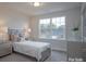 Bright bedroom with a double bed, large window, and neutral decor at 200 Fostoria Pl # 78A, Albemarle, NC 28001