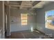 Dining room with a coffered ceiling, chandelier, and large windows at 200 Fostoria Pl # 78A, Albemarle, NC 28001