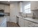 Kitchen with white cabinets, granite countertops, and stainless steel appliances at 200 Fostoria Pl # 78A, Albemarle, NC 28001