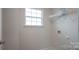 Laundry room with window and wire shelving at 200 Fostoria Pl # 78A, Albemarle, NC 28001