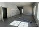A bright, spacious living room is under construction with fresh paint at 200 Fostoria Pl # 78A, Albemarle, NC 28001