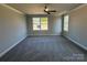 Bedroom showcasing a window and neutral carpet at 202 Fostoria Pl # 78B, Albemarle, NC 28001