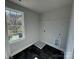 Laundry room with a window for natural light and shelving at 202 Fostoria Pl # 78B, Albemarle, NC 28001
