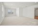 Bright, spacious bedroom featuring plush carpeting, a large window, and neutral paint for a serene atmosphere at 2234 Millennium Dr # 84, Lancaster, SC 29720