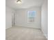 Bedroom with neutral carpet and access to other rooms at 2234 Millennium Dr # 84, Lancaster, SC 29720