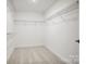 Walk-in closet with multiple shelves for optimal storage and organization at 2234 Millennium Dr # 84, Lancaster, SC 29720