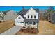 Inviting two-story home with a well-kept lawn and a two-car garage, perfect for a growing Gathering at 2234 Millennium Dr # 84, Lancaster, SC 29720
