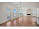 Bright living room featuring hardwood floors, a modern fireplace, and large windows with natural light at 2234 Millennium Dr # 84, Lancaster, SC 29720
