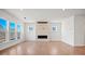 Spacious living room with hardwood floors, a modern fireplace, and large windows providing ample natural light at 2234 Millennium Dr # 84, Lancaster, SC 29720