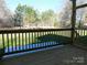 Wooden deck with a view of a grassy backyard and trees at 2270 Charlotte Hwy, York, SC 29745