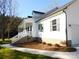 White house with gray roof, brick base, and front porch at 2270 Charlotte Hwy, York, SC 29745