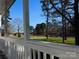 View from porch overlooking yard and trees at 2270 Charlotte Hwy, York, SC 29745