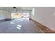 Spacious garage with brick accent walls and an open overhead door at 2270 Charlotte Hwy, York, SC 29745