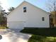 Two-car garage with white exterior and concrete driveway at 2270 Charlotte Hwy, York, SC 29745