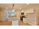 Modern kitchen with granite island and white cabinets at 2270 Charlotte Hwy, York, SC 29745