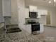 Modern kitchen with stainless steel appliances and granite countertops at 2270 Charlotte Hwy, York, SC 29745