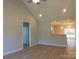 Open living room with kitchen view and hardwood floors at 2270 Charlotte Hwy, York, SC 29745