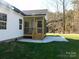 House side view with a wooden screened porch at 2270 Charlotte Hwy, York, SC 29745