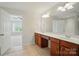 Bathroom featuring a double vanity with a large mirror and tiled flooring at 310 Rose Garden Ct, Rock Hill, SC 29732