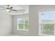 Bedroom with a ceiling fan and natural light streaming through two windows at 310 Rose Garden Ct, Rock Hill, SC 29732