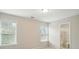 Bedroom with two windows providing ample natural light, next to the bathroom at 310 Rose Garden Ct, Rock Hill, SC 29732