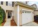 Townhome entry with black door and white garage at 310 Rose Garden Ct, Rock Hill, SC 29732