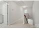 Hallway with a staircase and access to the laundry room at 310 Rose Garden Ct, Rock Hill, SC 29732