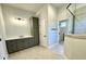 Bathroom featuring a glass shower, vanity with storage, and tiled floors at 3850 Willow Grove Ln # 24, Concord, NC 28025