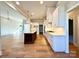 Modern kitchen featuring white cabinets and a contrasting center island at 3850 Willow Grove Ln # 24, Concord, NC 28025